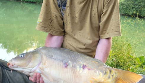 A 24 lb fish from Eau De Vie South, Nice scaley, Jul 2023