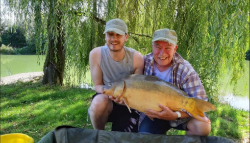 A 25 lb 3 oz carp from Eau De Vie South, Father and son. , Aug 2019