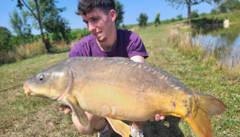 A 29 lb carp from Heart Lake, Jul 2023