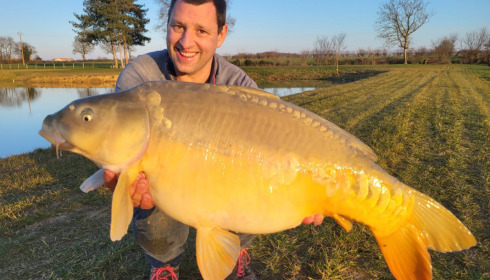 A 22 lb carp from Heart Lake, Feb 2023