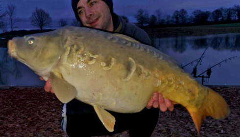A 25 lb carp from Heart Lake, Feb 2023