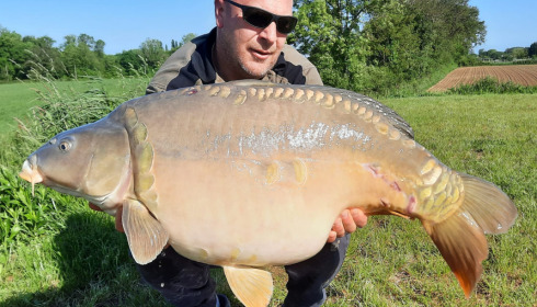 A 40 lb carp from Heart Lake, May 2023