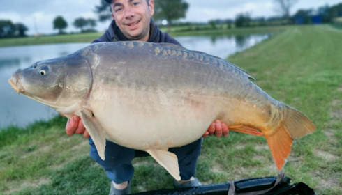A 35 lb 2 oz carp from Heart Lake, Apr 2023