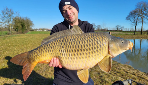 A 22 lb carp from Heart Lake, Feb 2023