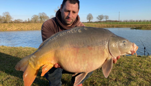 A 27 lb carp from Heart Lake, 1, Feb 2023