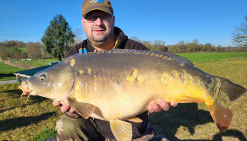 A 31 lb carp from Heart Lake, Feb 2023
