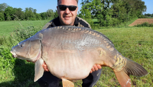 A 41 lb 8 oz carp from Heart Lake, May 2023