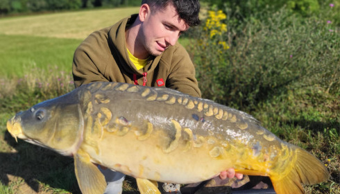A 28 lb carp from Heart Lake, Jul 2023