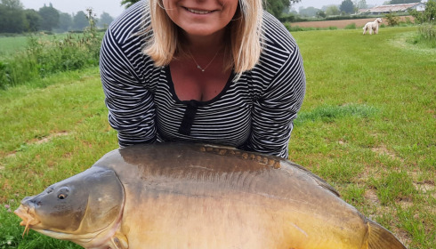 A 39 lb 6 oz carp from Heart Lake, May 2023