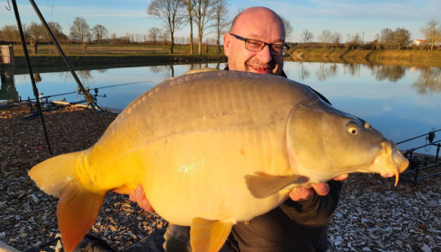 A 23 lb carp from Heart Lake, Feb 2023