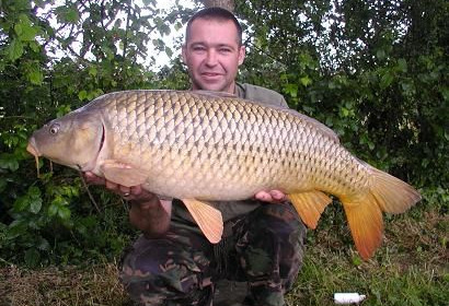 A 22 lb 8 oz carp from Laroussi, Immaculate resident common, May 2007