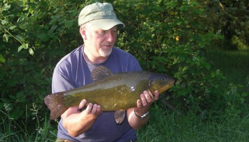 A carp from Laroussi, 8lb6oz tench, Jun 2008
