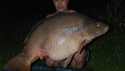 A 57 lb carp from Laroussi, Mark Yuen, Jun 2012