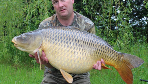 A 44 lb 12 oz carp from Laroussi, Tim Savage with his stunning common, May 2014