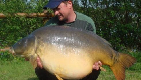 A 64 lb carp from Laroussi, May 2010