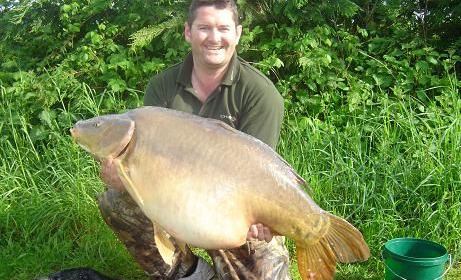 A 52 lb 7 oz carp from Laroussi, May 2008