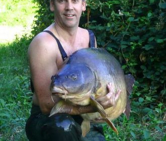 A 66 lb carp from Laroussi, Jul 2008