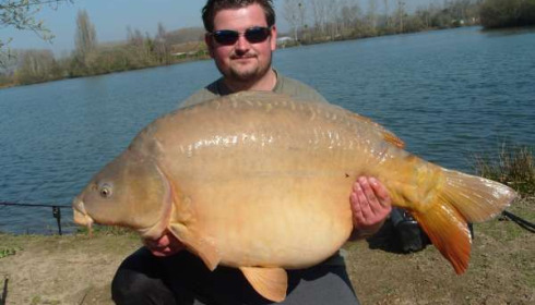 A 49 lb 9 oz carp from Laroussi, Andy Gilbert and Stu Cliff, Mar 2011