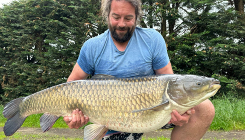 A 59 lb 8 oz grass carp from Laroussi, Rik Le Ray, May 2023
