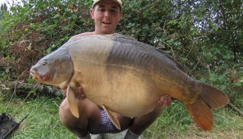 A 44 lb carp from Laroussi, Aug 2008