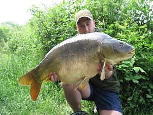 A 34 lb carp from Laroussi, May 2007