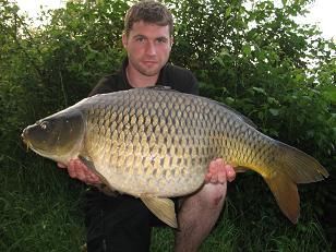 A 25 lb carp from Laroussi, May 2007