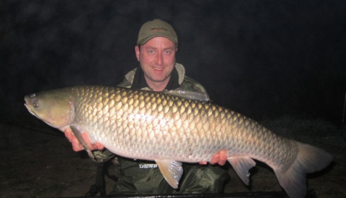 A 42 lb grass carp from Laroussi, Apr 2012