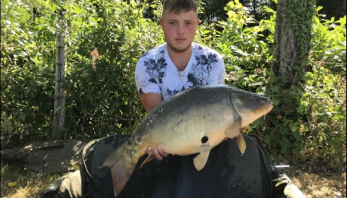 A 27 lb 10 oz carp from Lillybelle, Chad Hand, Aug 2018