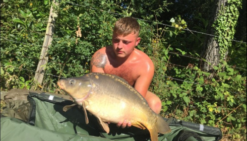 A 23 lb 8 oz carp from Lillybelle, Chad Hand, Aug 2018