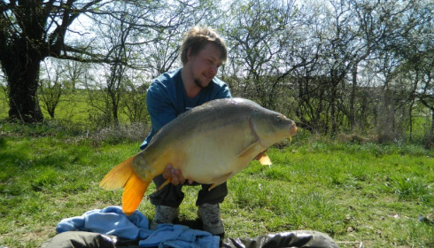 A 34 lb 8 oz carp from Lillypool, Huw, Mar 2012
