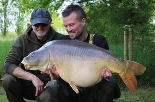 A 40 lb carp from Lillypool, Martin & Josh bennett, May 2022