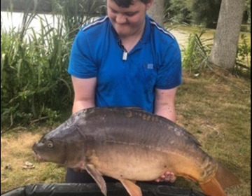 A 31 lb carp from Lillypool, Toby May, Aug 2019