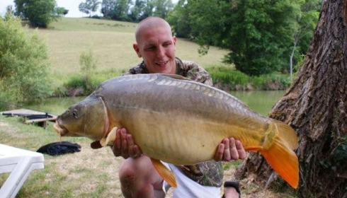 A 32 lb 4 oz carp from Mas Bas Lotus Lake, May 2011
