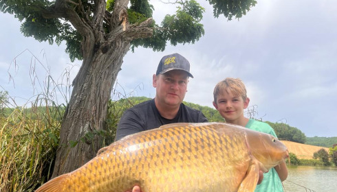 A 34 lb 4 oz fish from Mas Bas Main Lake, Terrible pic but beautiful common, Jul 2023
