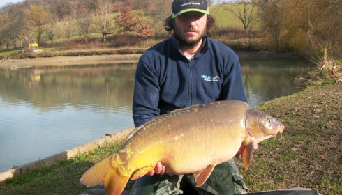 A 38 lb 5 oz carp from Mas Bas Main Lake, netting Jan 2014, Jan 2014