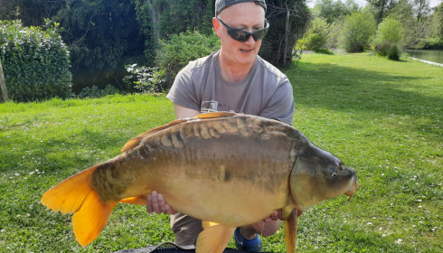 A 28 lb 8 oz carp from Mas Bas Main Lake, George Lebeau, May 2022