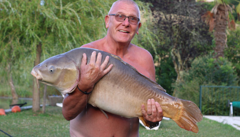 A 40 lb fish from Mas Bas Main Lake, Mirror, Jul 2023