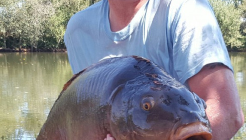 A 40 lb carp from Old Oaks, Stephen Kennerley, Aug 2016