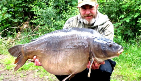 A 55 lb 8 oz carp from Old Oaks, May 2014