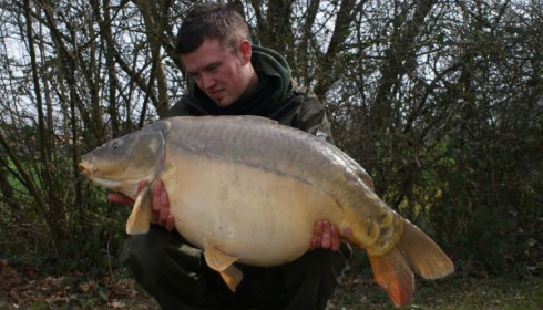 A 42 lb 4 oz carp from Villefond, Mar 2011