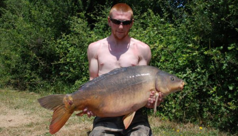 A 34 lb 11 oz carp from Villefond, May 2011