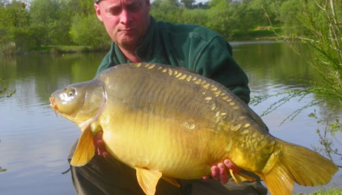 A 34 lb carp from Villefond, Apr 2011