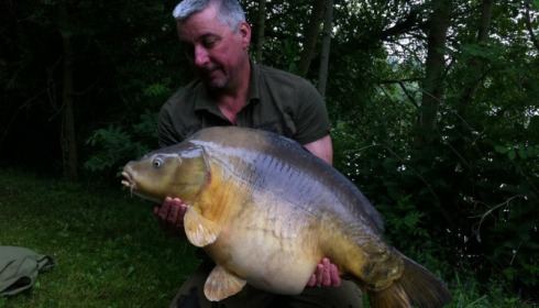 A 38 lb carp from Villefond, Stephen Horrocks with son of Max the fish, Jun 2013