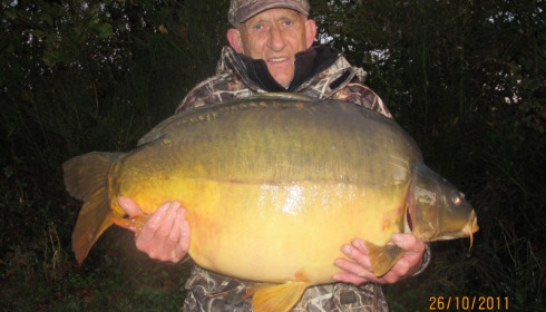 A 50 lb 10 oz carp from Villefond, John with Arnold the fish, Oct 2011