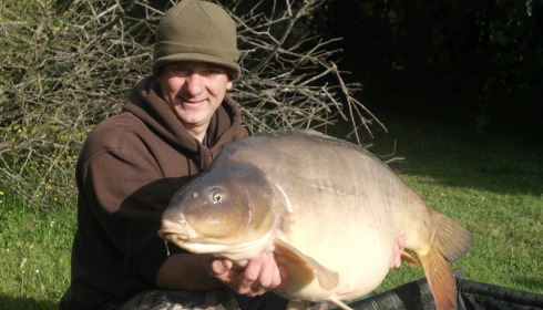 A 49 lb 10 oz carp from Villefond, May 2014