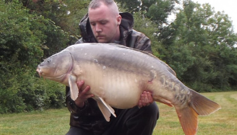 A 39 lb carp from Villefond, Mark Lambert and anougher heavily spawned out carp, Aug 2012