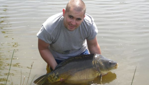 A 32 lb 8 oz carp from Villefond, May 2009