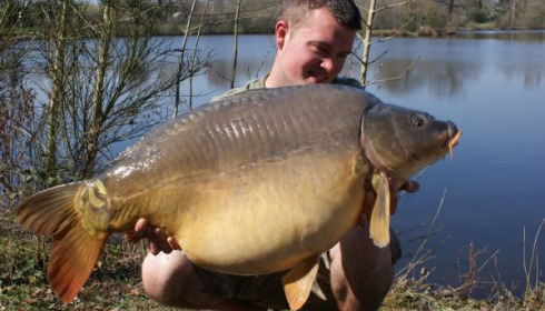 A 34 lb 6 oz carp from Villefond, Mar 2011