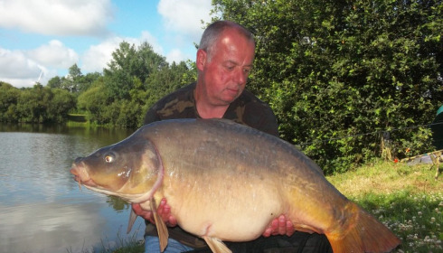 A 33 lb carp from Villefond, Jul 2012