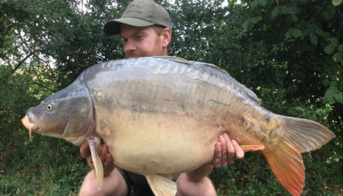 A 37 lb 13 oz carp from Villefond, Aug 2018